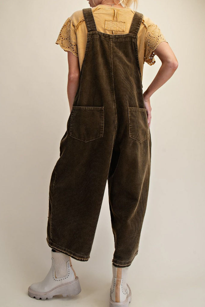 oversized olive green corduroy overalls with patchwork flower applique details 