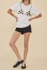 classic white tee with a cheeky beaded bikini design