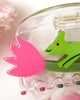clear acetate hair claw with a green chameleon holding on to a pink tulip