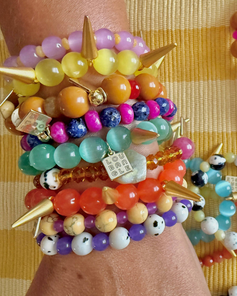 chill days stacker bracelet styled with other stacker bracelets