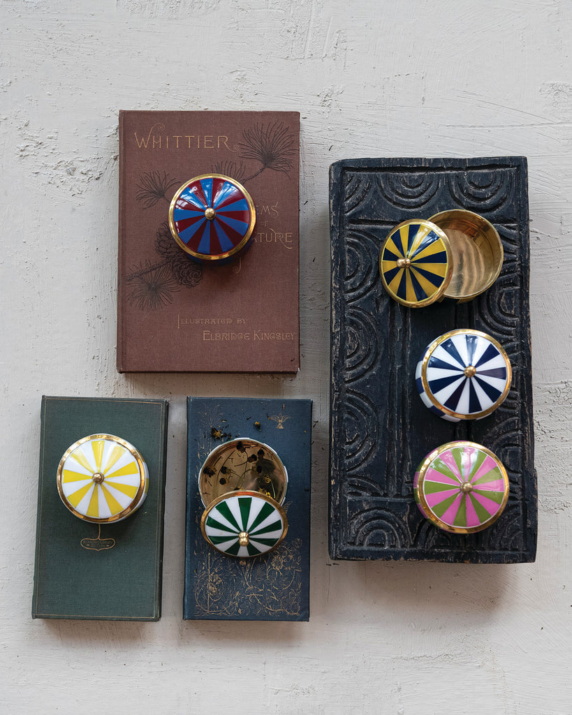 small storage boxes in the shape of a striped circus tent