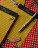 classic yellow notepad with a vintage-inspired design