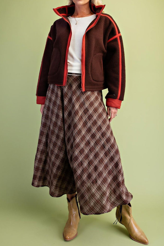 chocolate brown fleece jacket with bold red contrast trim