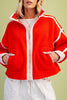 fiery red fleece jacket with white contrast trim