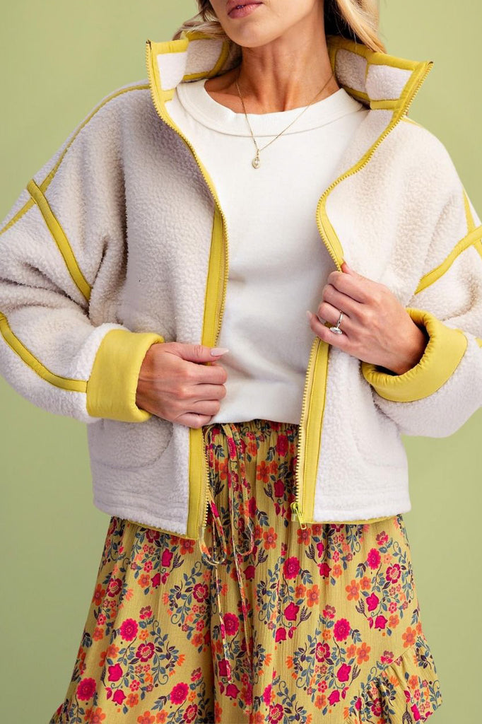 fleece jacket with bright yellow contrast trim 