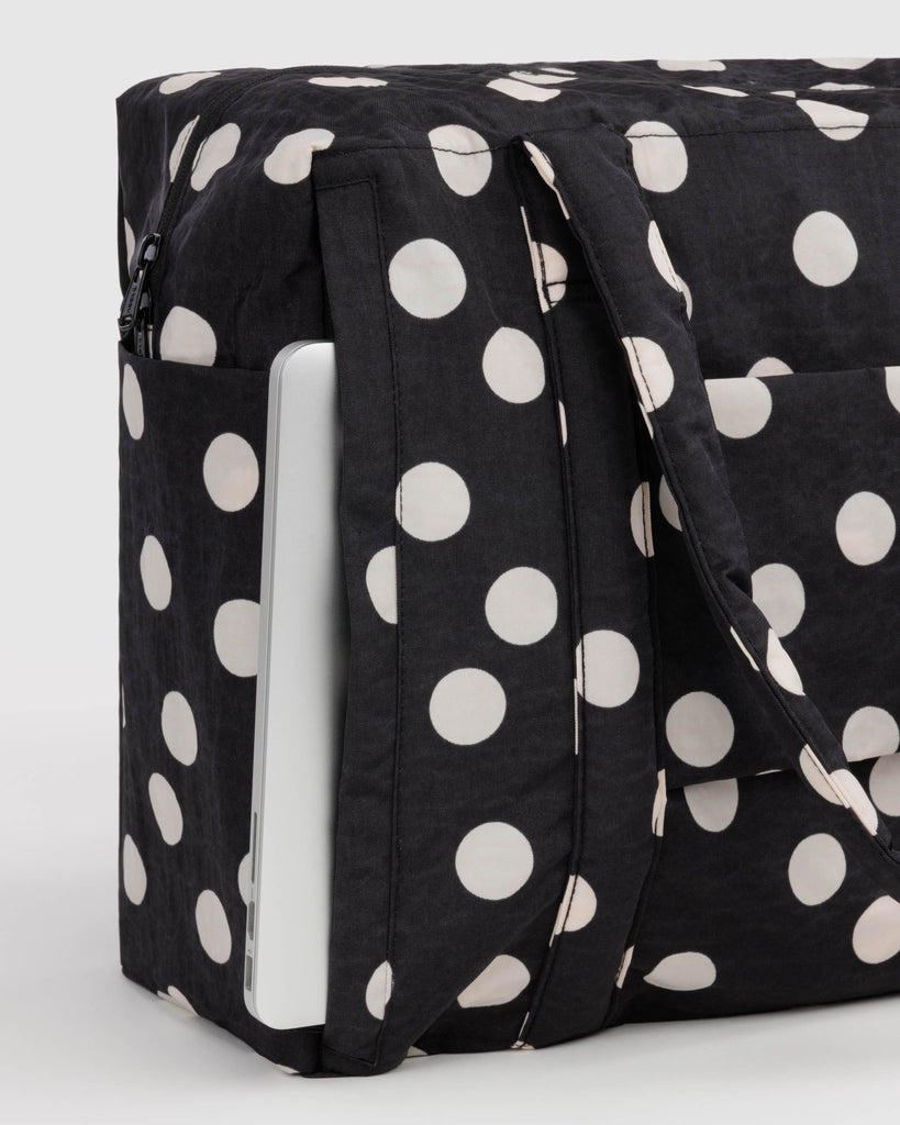 cloud carry-on bag in black and cream polka dot