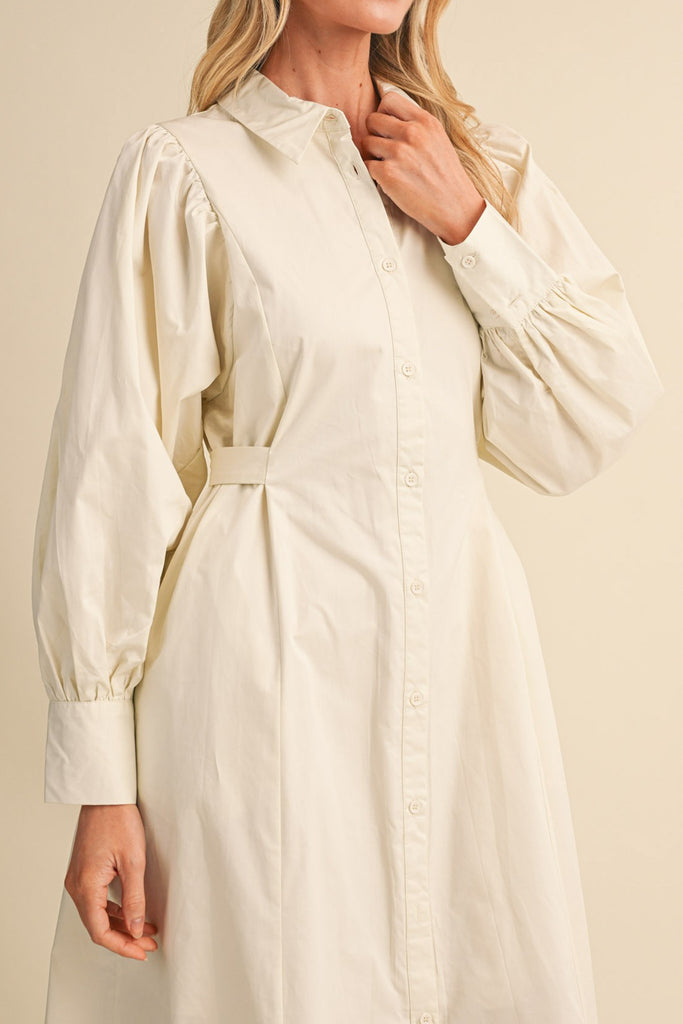 cloud white midi dress with a gathered waist and a classic shape