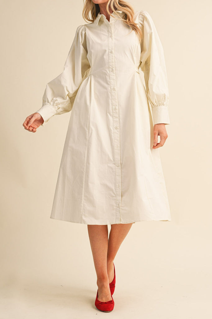 cloud white midi dress with a gathered waist and a classic shape