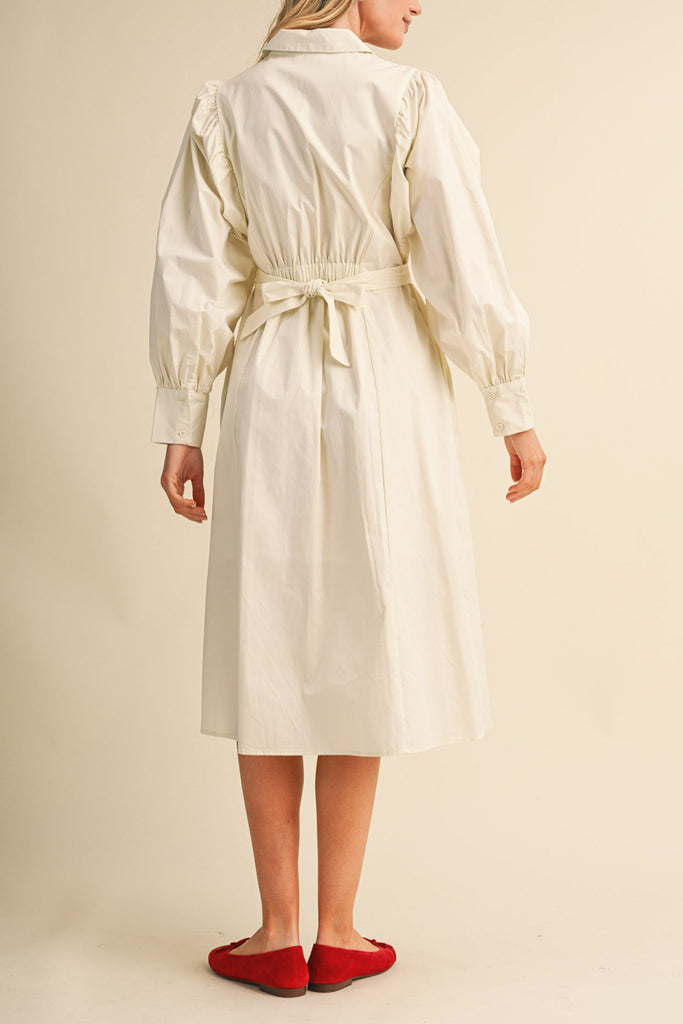 cloud white midi dress with a gathered waist and a classic shape