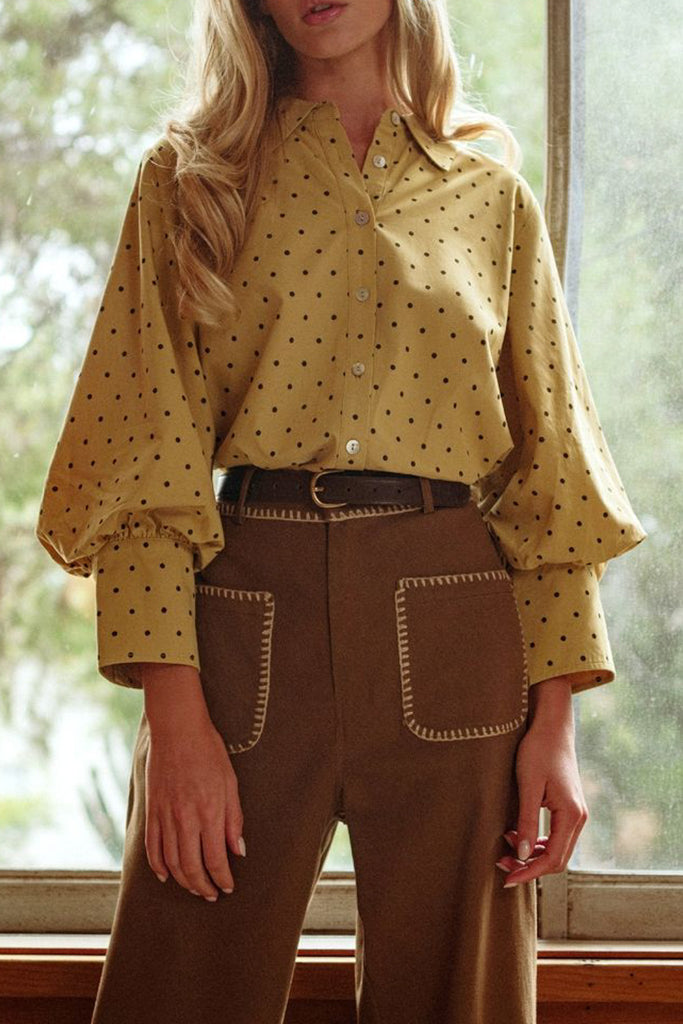 lightweight button down blouse in mustard yellow with black polka dots