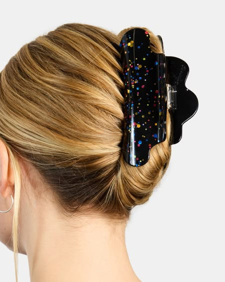 large black hair claw with colorful rainbow confetti glitter