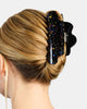 large black hair claw with colorful rainbow confetti glitter