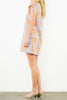 shift dress in a summery plaid pattern with ruffled neckline and tie detail