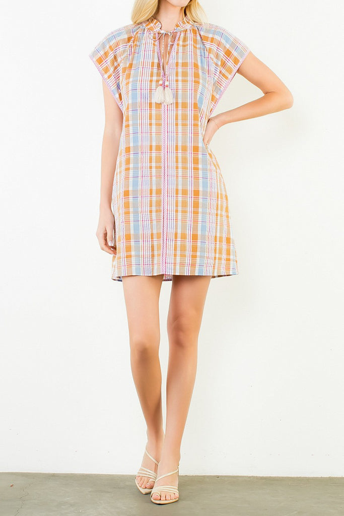 shift dress in a summery plaid pattern with ruffled neckline and tie detail
