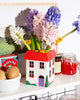 novelty vase in the shape of a cottage