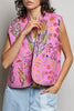 quilted vest in a pink floral pattern