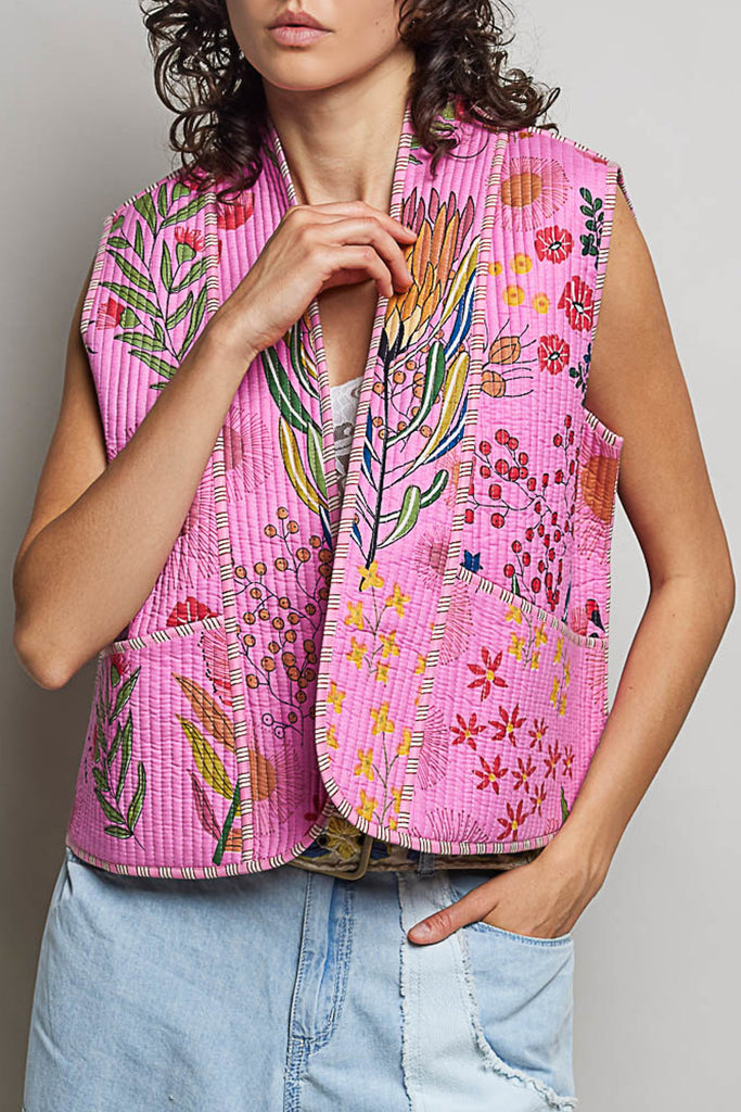 quilted vest in a pink floral pattern