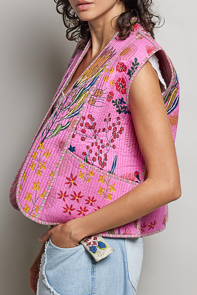 quilted vest in a pink floral pattern