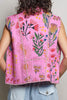 quilted vest in a pink floral pattern