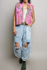 quilted vest in a pink floral pattern