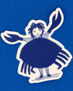 A die-cut sticker featuring a whimsical illustration of a girl with curly hair wearing a large blue crab shell dress, standing on a cream-colored background.