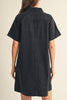 washed black denim mini dress with a collared v neckline and front patch pockets 