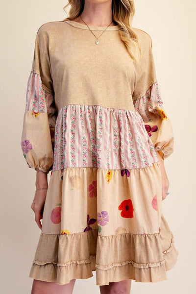 washed yellow jersey dress with floral print details and a tiered skirt