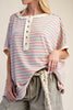 oversized cream colored top in turquoise and red stripes