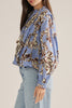 floral bubble top in dusty  blue, cream, and brown