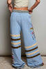 ultra soft chenille pants in sky blue with cream and brown stripes and special sewn floral details. 