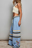 ultra soft chenille pants in sky blue with cream and brown stripes and special sewn floral details. 