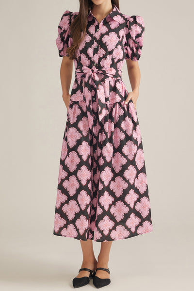 button down shirt dress in a striking black and pink abstract pattern