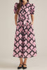 button down shirt dress in a striking black and pink abstract pattern