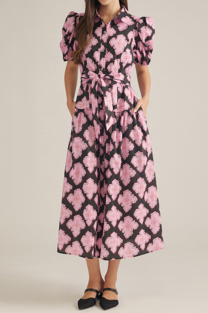 button down shirt dress in a striking black and pink abstract pattern