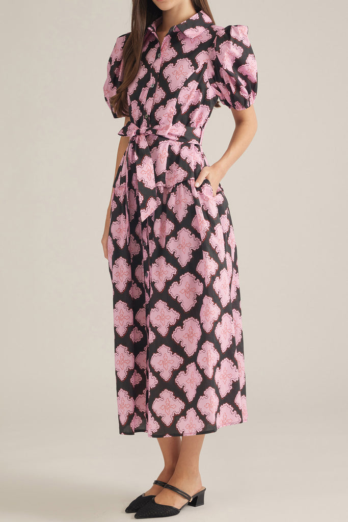 button down shirt dress in a striking black and pink abstract pattern