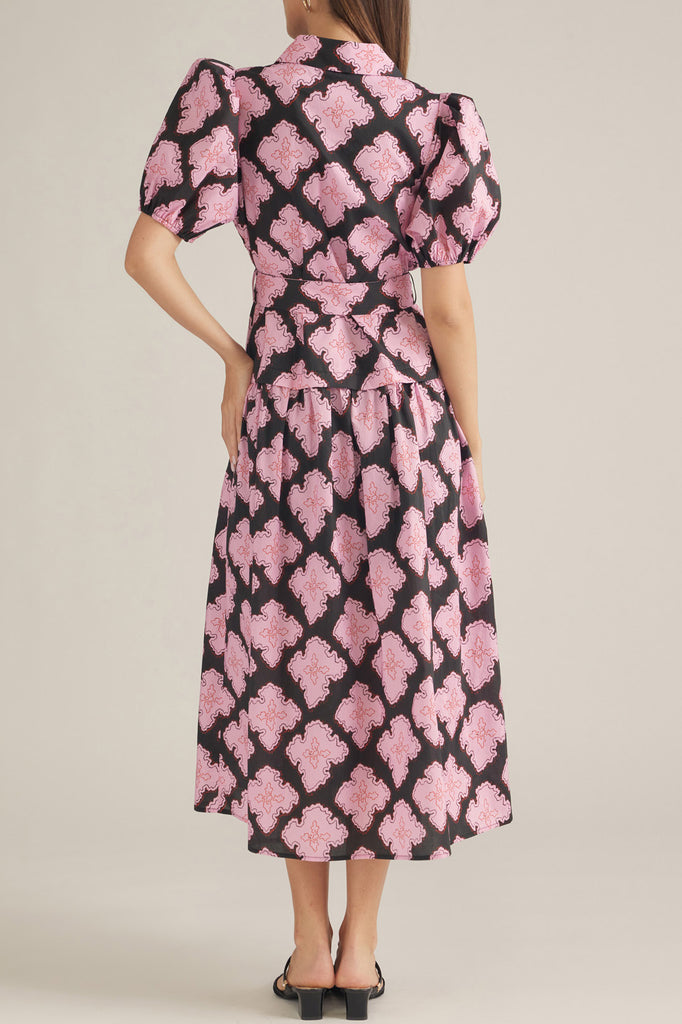 button down shirt dress in a striking black and pink abstract pattern