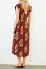 striking brick red dress with a beautiful floral design