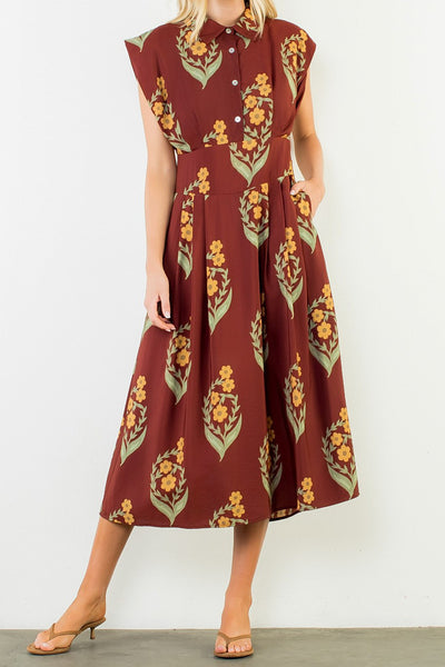 striking brick red dress with a beautiful floral design