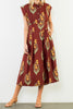 striking brick red dress with a beautiful floral design
