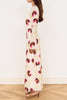 cream colored midi dress in a purple and gold floral pattern with mesh long sleeves from minkpink