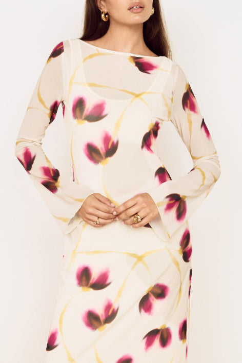 cream colored midi dress in a purple and gold floral pattern with mesh long sleeves from minkpink