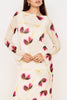 cream colored midi dress in a purple and gold floral pattern with mesh long sleeves from minkpink