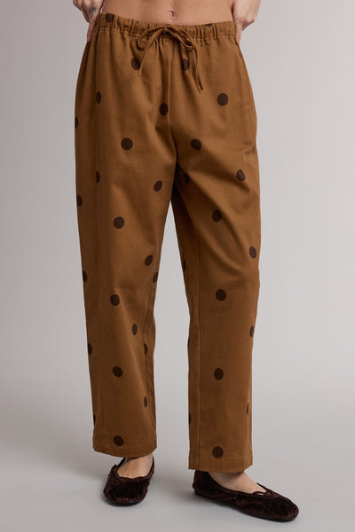 camel pull-on trousers with chocolate brown polka dots throughout