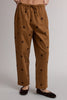 camel pull-on trousers with chocolate brown polka dots throughout