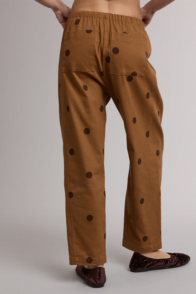 camel pull-on trousers with chocolate brown polka dots throughout