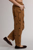 camel pull-on trousers with chocolate brown polka dots throughout