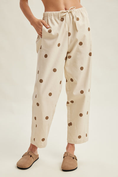 off white trousers with cute polka dots in deep ochre