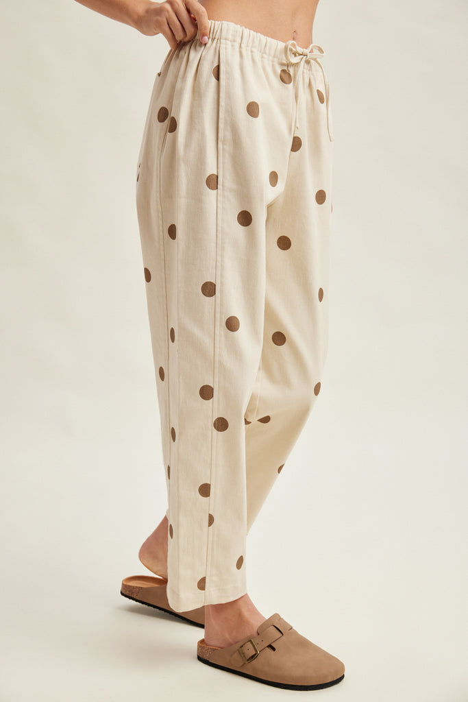 off white trousers with cute polka dots in deep ochre