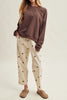 off white trousers with cute polka dots in deep ochre