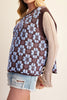 oversized knit sweater vest in chocolate brown with a sky blue argyle-inspired floral pattern 